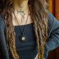 Kaya • Carved Labradorite mandala macrame necklace